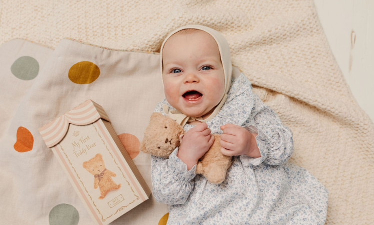baby holding maileg my first teddy