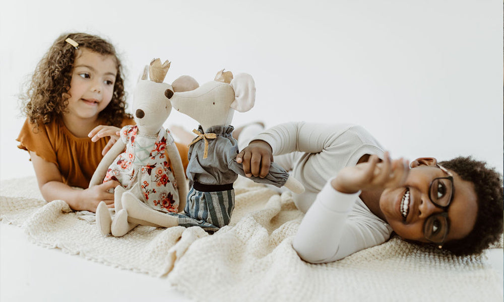 Two children with Maileg Maxi Prince and Princess Mouse